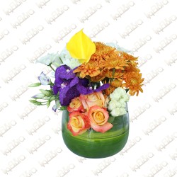 Tall Glass with flower arrangement